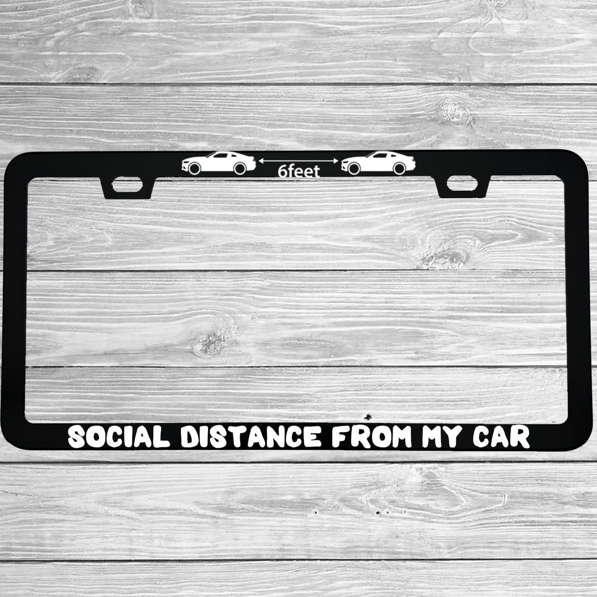 Close-up of "6 Feet Social Distance From My Car" license plate frame showing fade-proof print quality