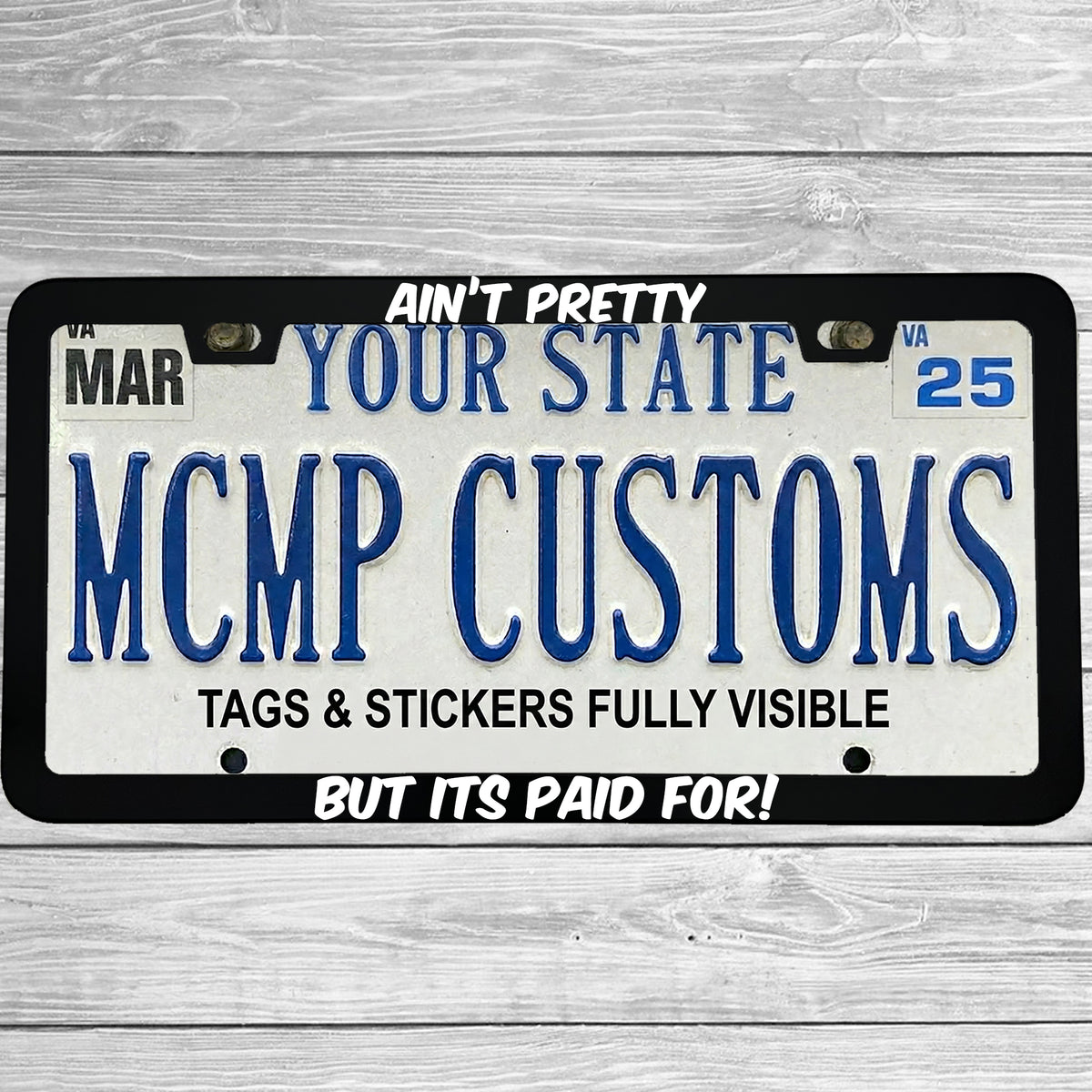 "Ain't Pretty But Its Paid For" license plate frame shown on vehicle β lifestyle photo