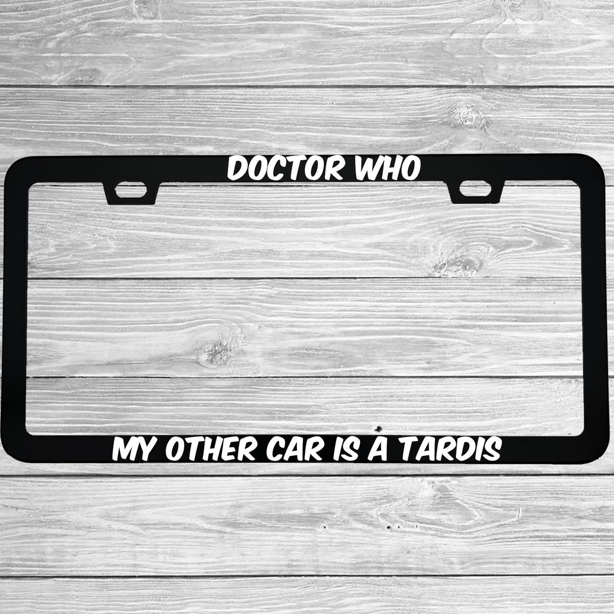 Close-up of "Doctor Who My Other Car Is A Tardis" license plate frame showing fade-proof print quality