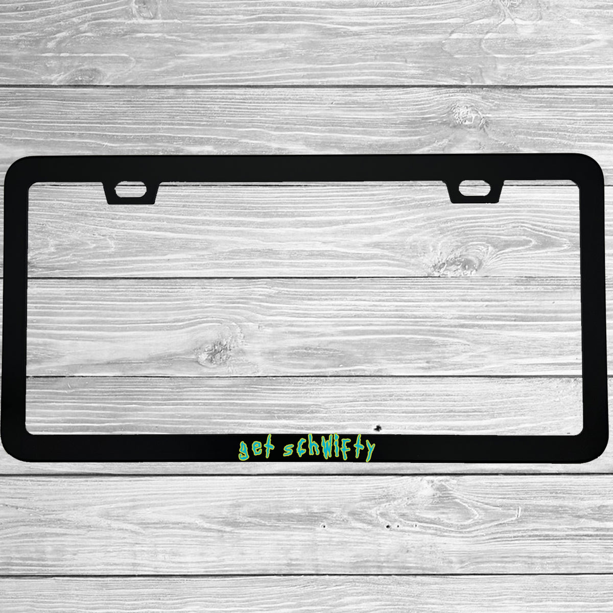 Close-up of "Get Schwifty" license plate frame showing fade-proof print quality