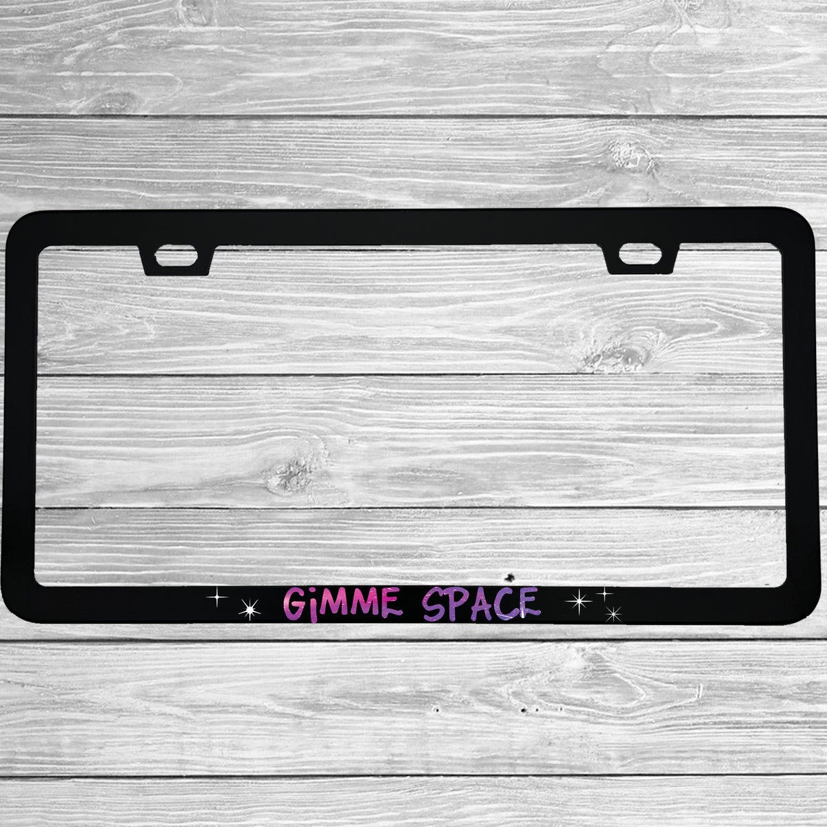 Close-up of "Gimme Space" license plate frame showing fade-proof print quality