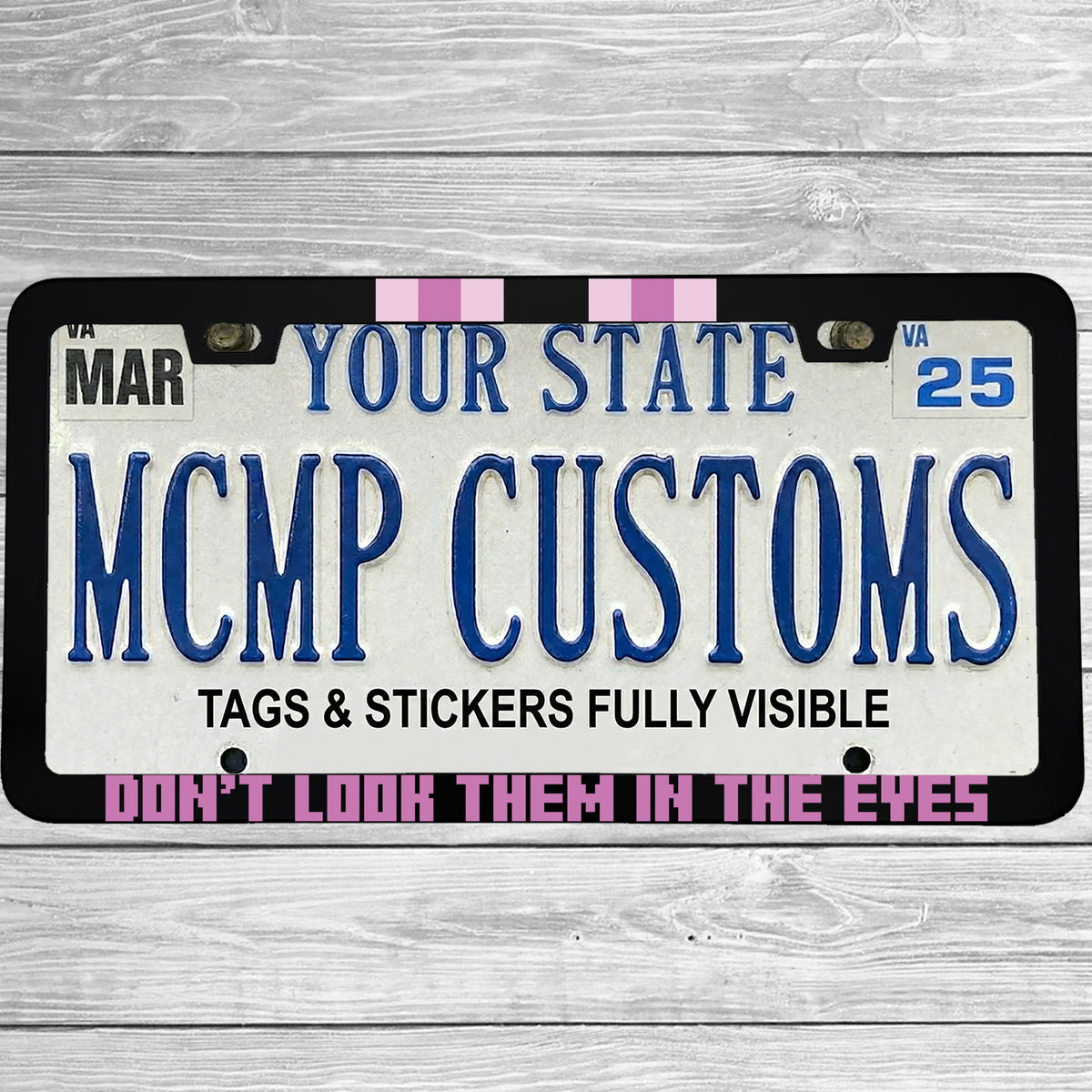 "Don't Look Them In The Eyes Minecraft Enderman" license plate frame shown on vehicle — lifestyle photo