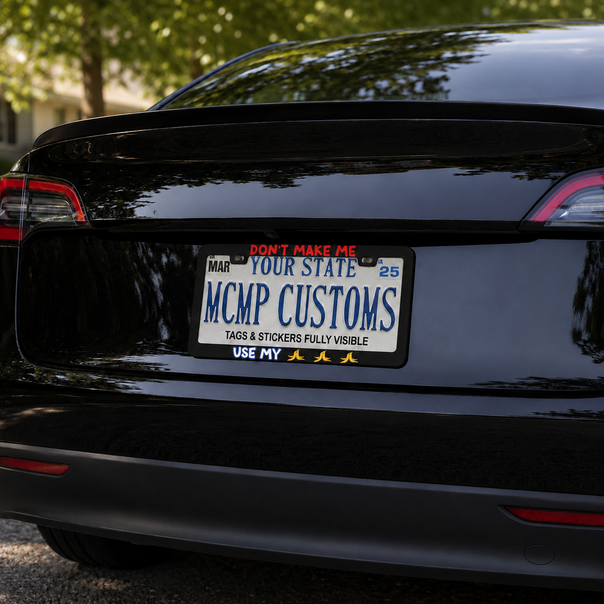 "Don't Make Me Use My Bananas Funny Gaming Cartoon" license plate frame shown on vehicle — lifestyle photo