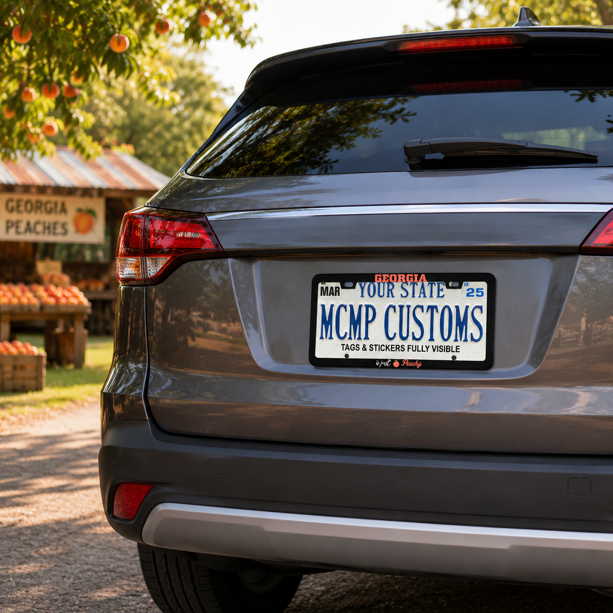 "Georgia Is Just Peachy Pride" license plate frame shown on vehicle β lifestyle photo