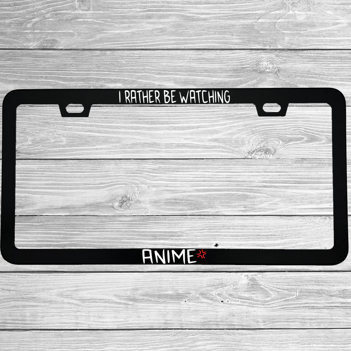 Close-up of "I'd Rather Be Watching Anime" license plate frame showing fade-proof print quality