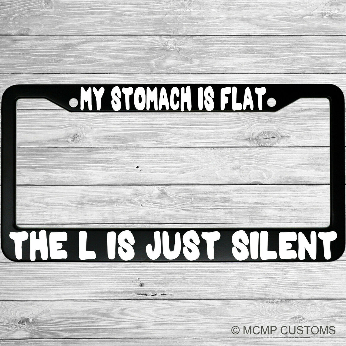 "My Stomach Is Flat The L Is Just Silent" license plate frame shown on vehicle β lifestyle photo