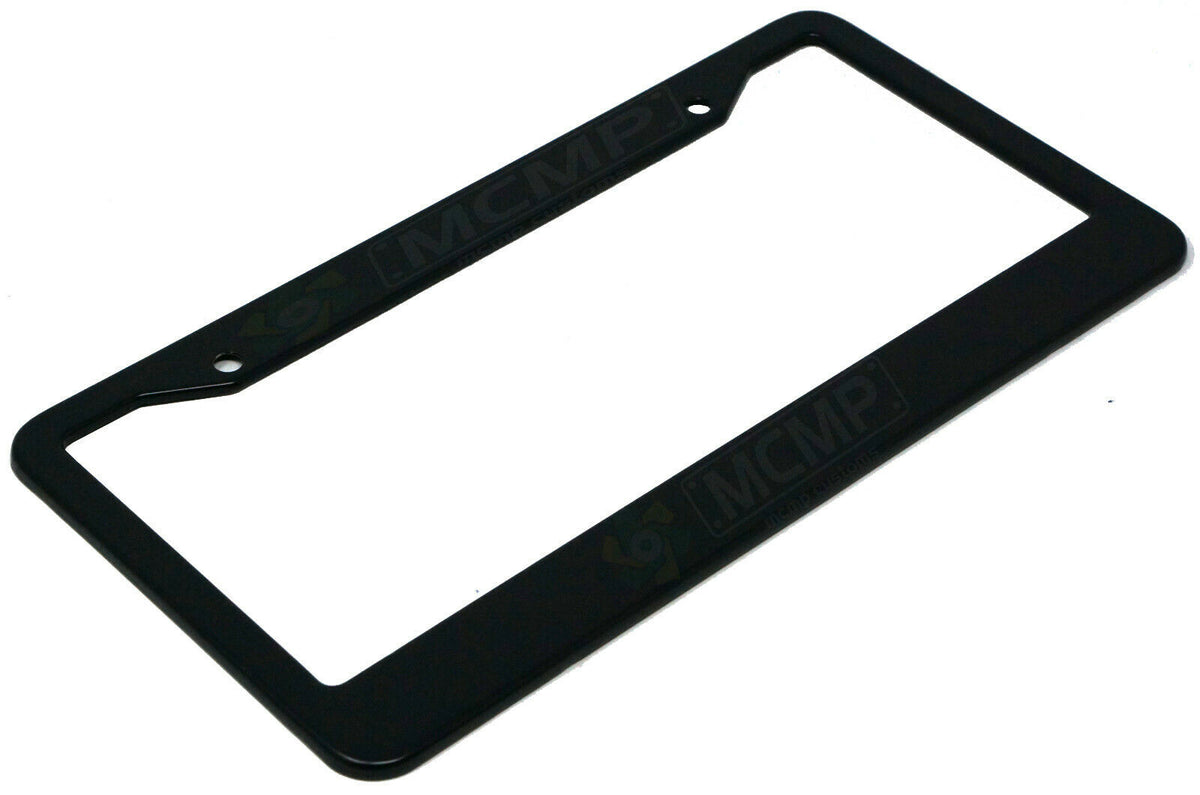 Close-up of "Not Poor" license plate frame showing fade-proof print quality