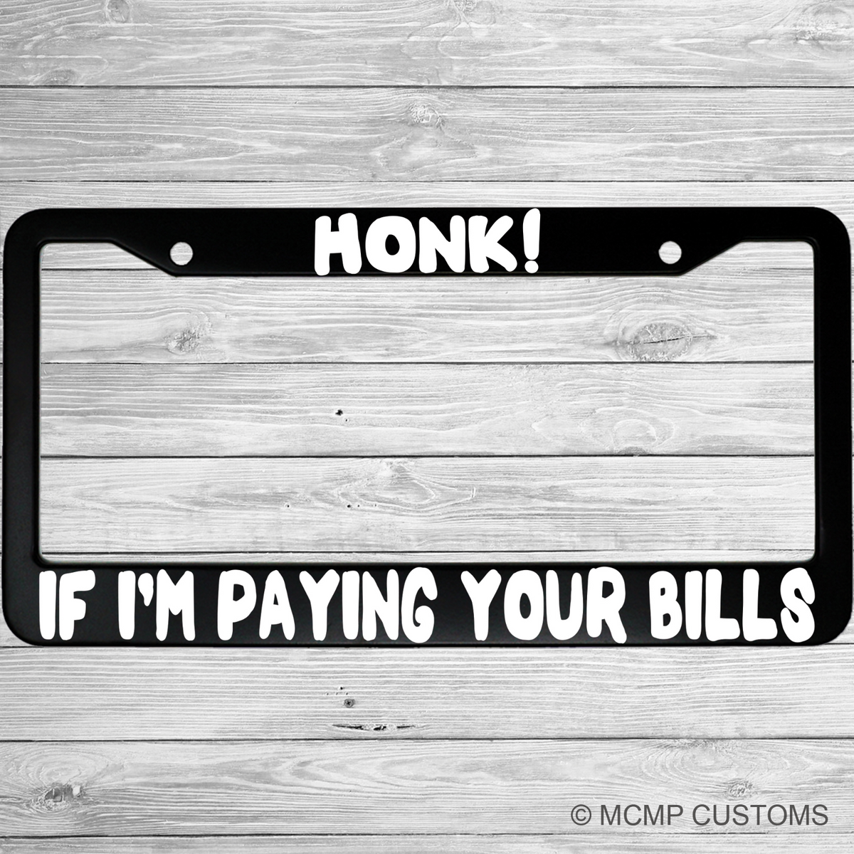 "Honk I'm Paying Your Bills" license plate frame shown on vehicle β lifestyle photo