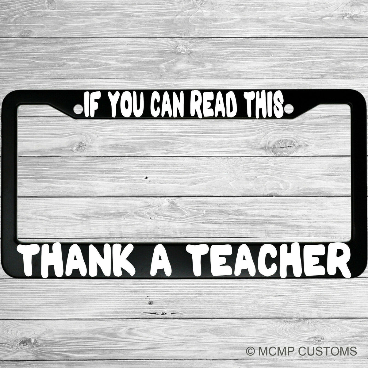 "If You Can Read This Thank A Teacher" license plate frame shown on vehicle — lifestyle photo