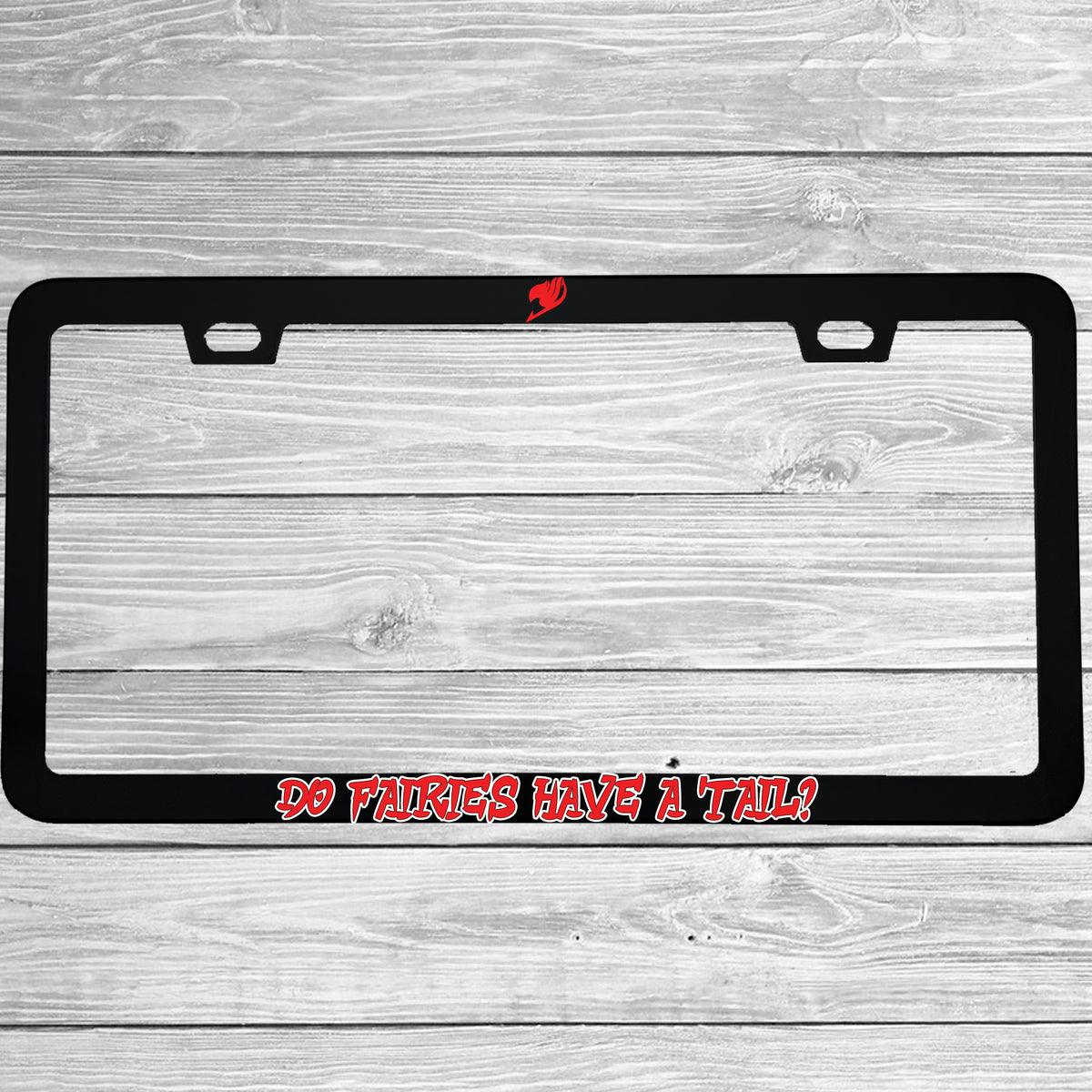 Close-up of "Do Fairies Have A Tail?" license plate frame showing fade-proof print quality