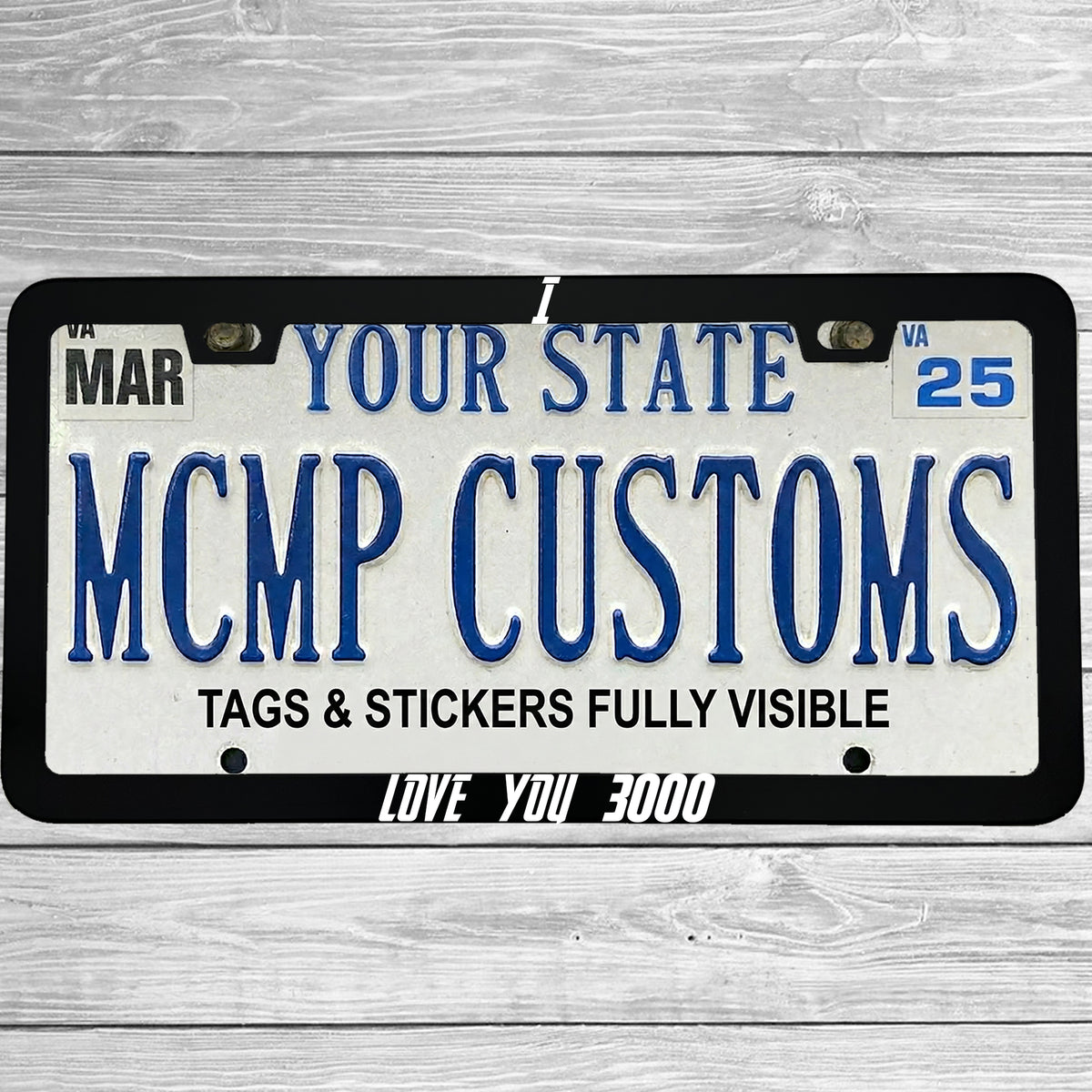 "I Love You 3000" license plate frame shown on vehicle — lifestyle photo