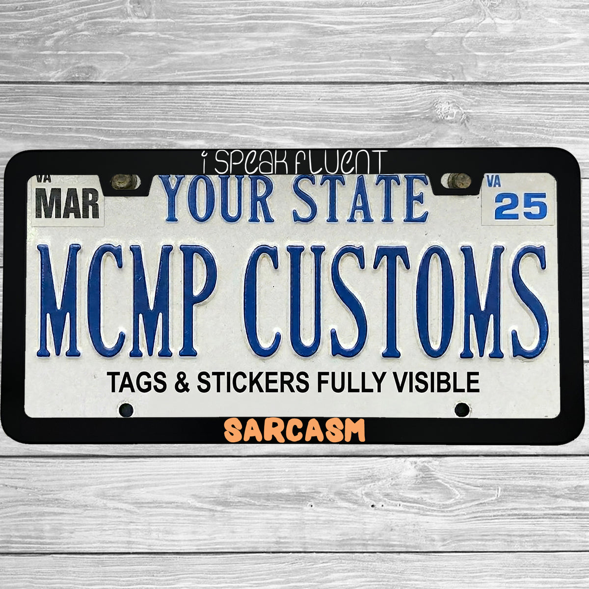 "I Speak Fluent Sarcasm" license plate frame shown on vehicle — lifestyle photo
