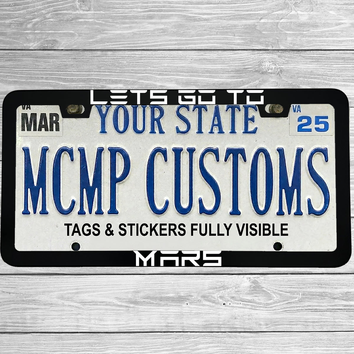 "Lets Go To Mars Funny Electric Car Outer Space" license plate frame shown on vehicle — lifestyle photo