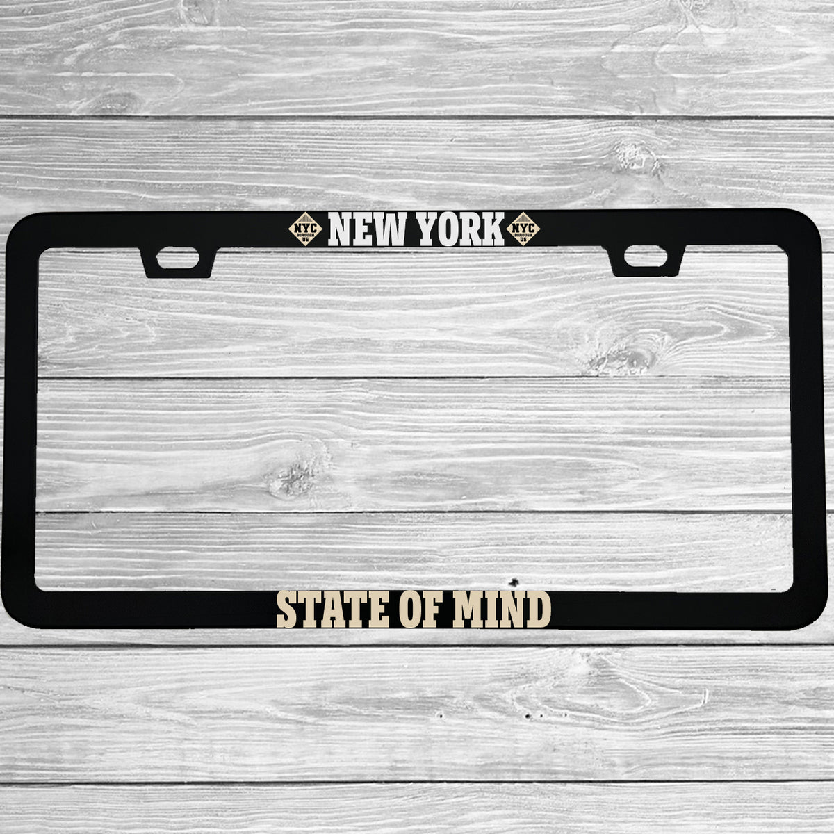 Close-up of "New York State of Mind" license plate frame showing fade-proof print quality