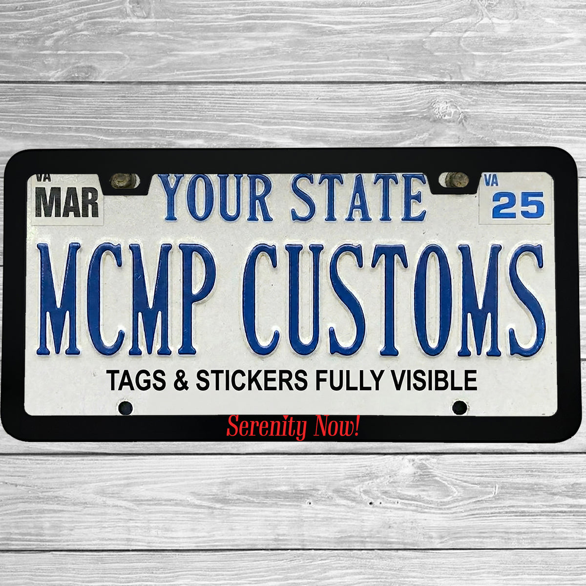 "Serenity Now" license plate frame shown on vehicle — lifestyle photo
