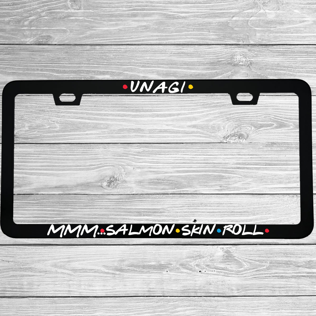 Close-up of "Unagi Mmm Salmon Skin Roll" license plate frame showing fade-proof print quality