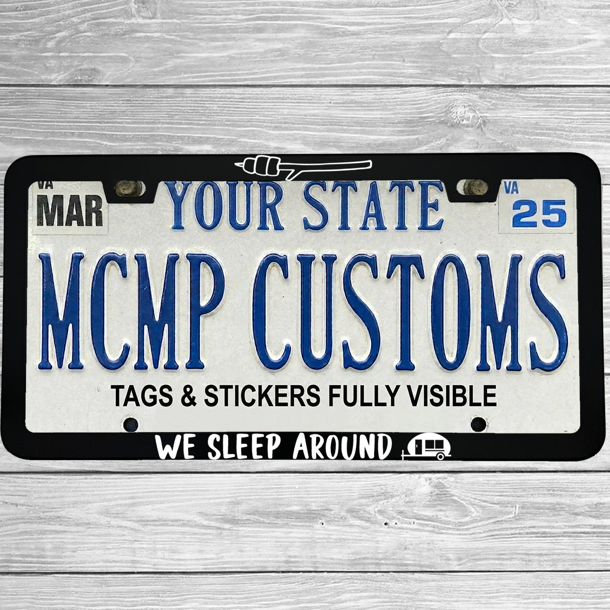 "We Sleep Around" license plate frame shown on vehicle — lifestyle photo