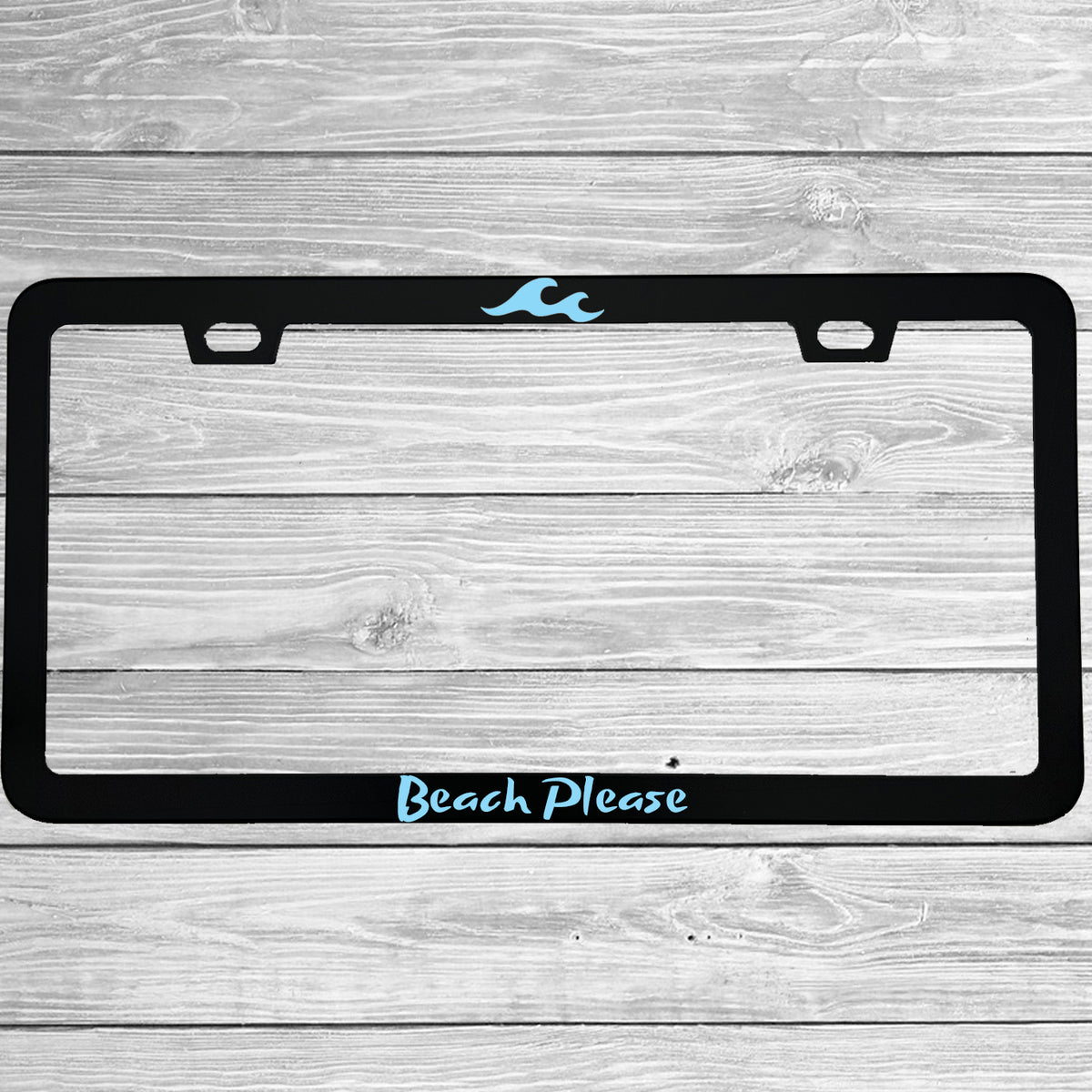 Close-up of "Beach Please" license plate frame showing fade-proof print quality