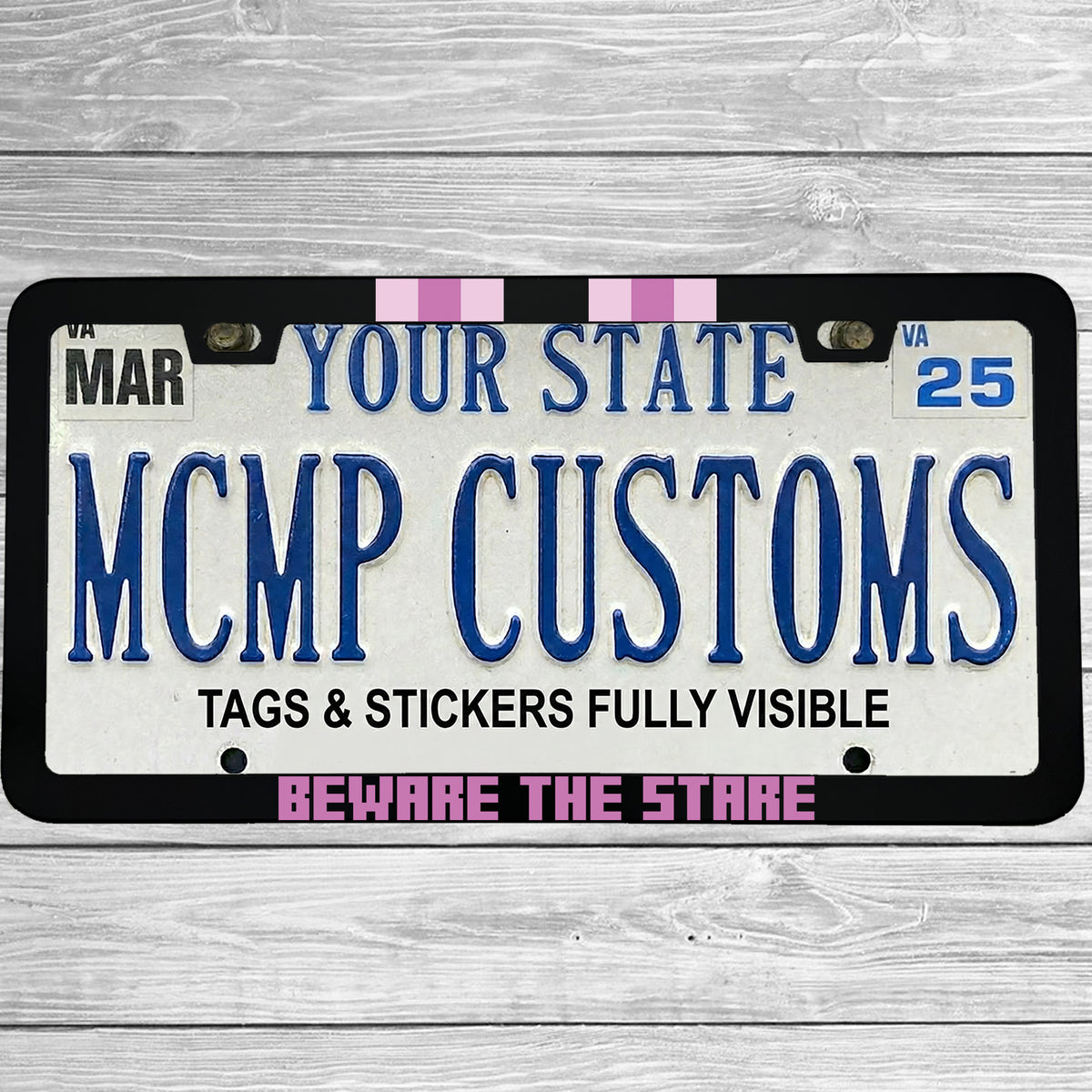 "Beware The Stare" license plate frame shown on vehicle — lifestyle photo