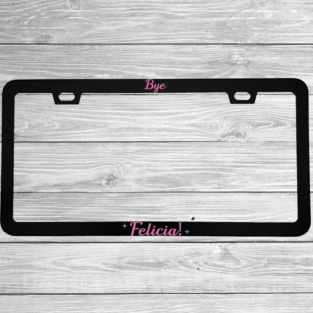 Close-up of "Bye Felicia" license plate frame showing fade-proof print quality