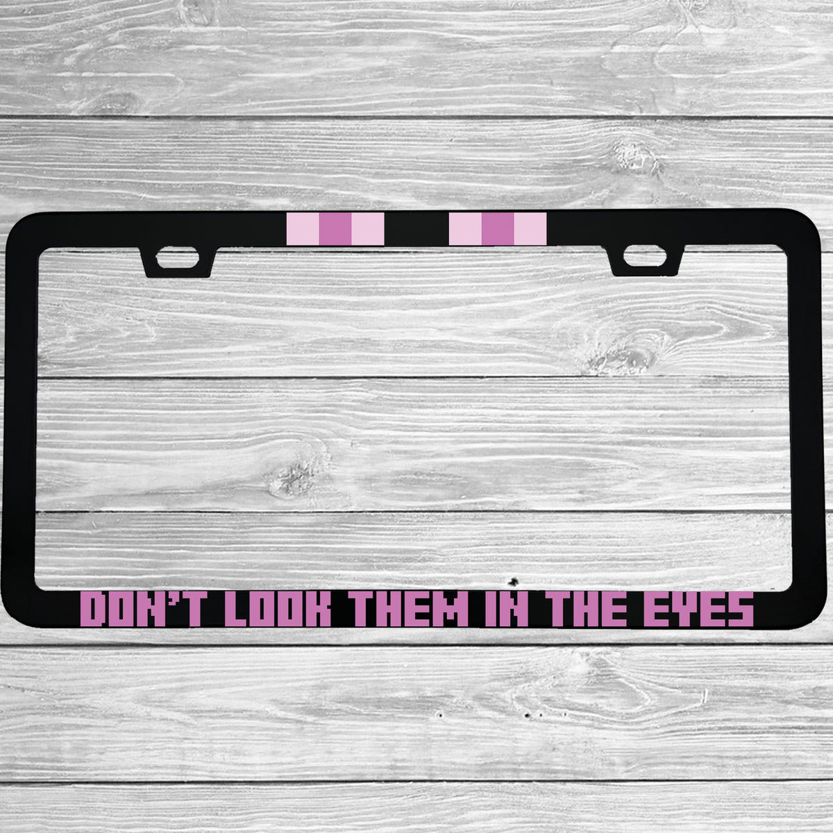 Close-up of "Don't Look Them In The Eyes Minecraft Enderman" license plate frame showing fade-proof print quality