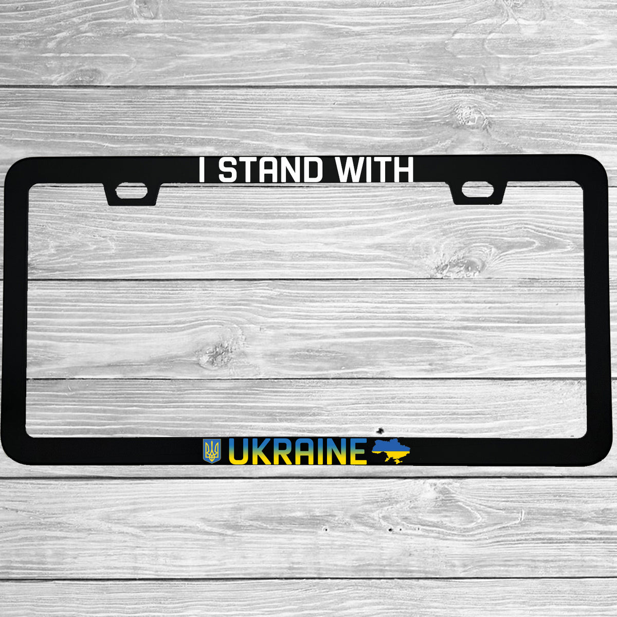 Close-up of "I Stand With Ukraine" license plate frame showing fade-proof print quality