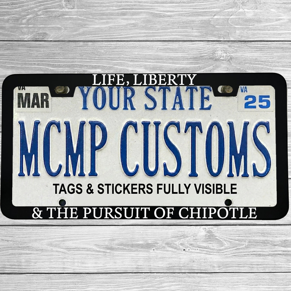 "Life Liberty And The Pursuit Of Chipotle" license plate frame shown on vehicle — lifestyle photo