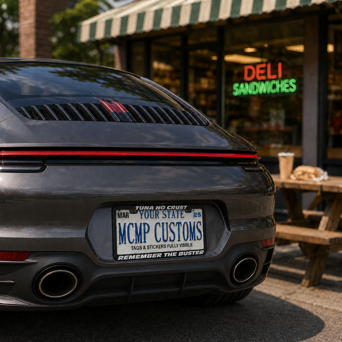 "Tuna No Crust Remember The Buster" license plate frame shown on vehicle — lifestyle photo