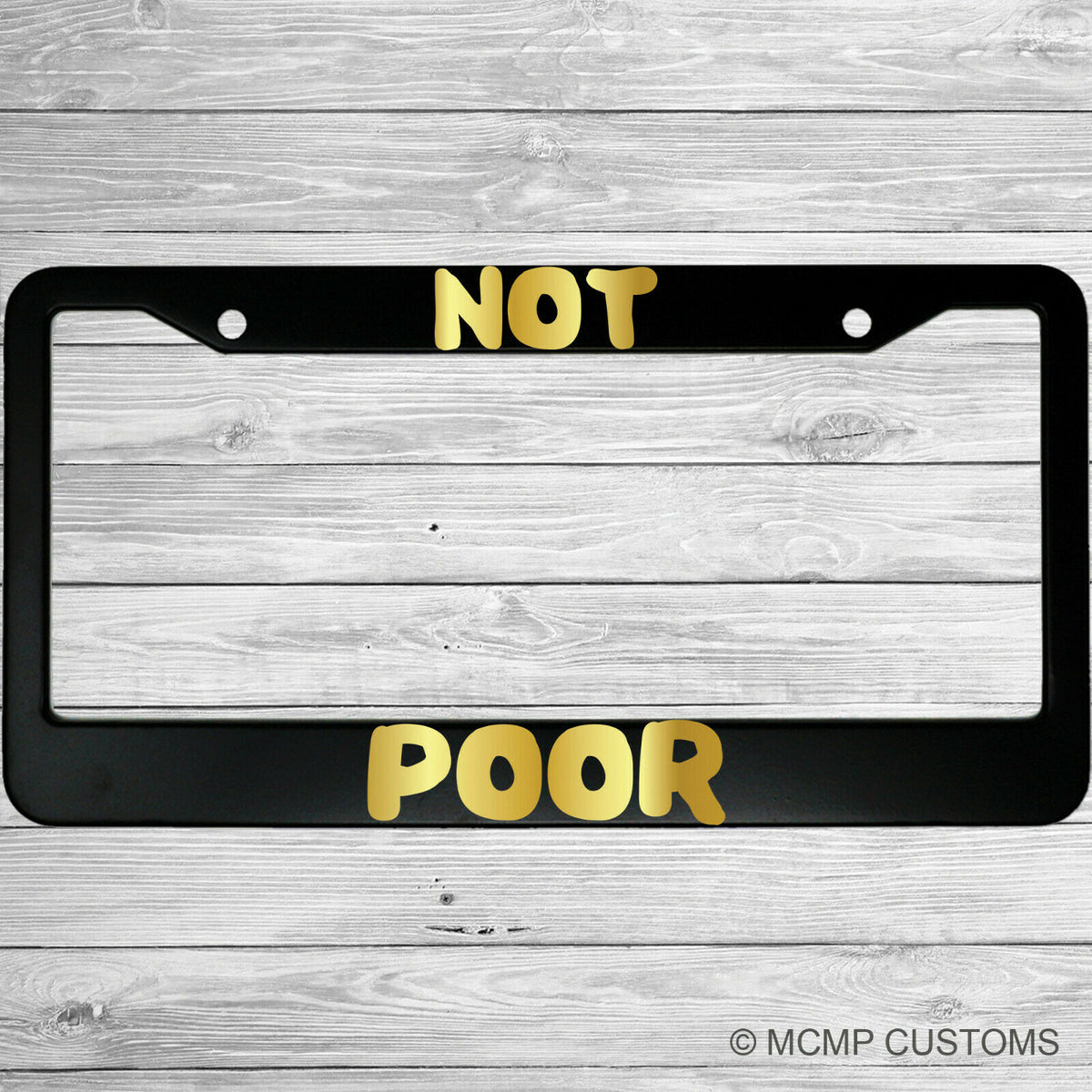 "Not Poor" license plate frame shown on vehicle — lifestyle photo