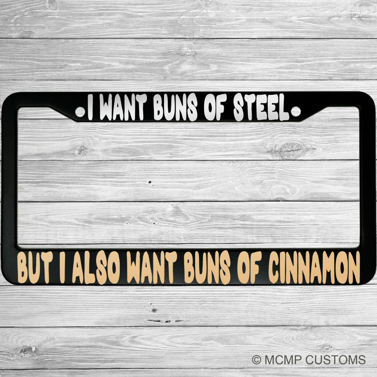 "I Want Buns of Steel" license plate frame shown on vehicle — lifestyle photo