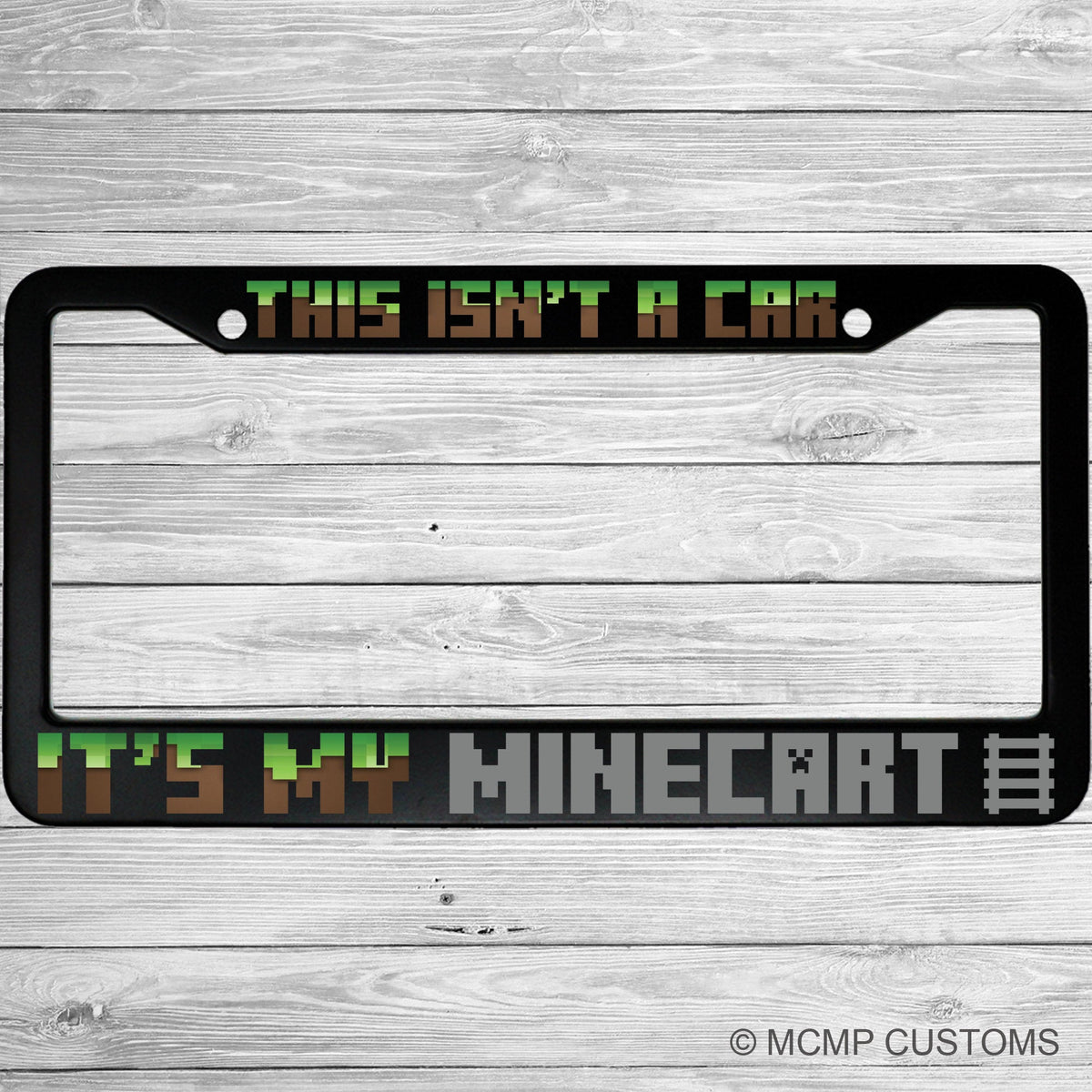 "This Isn't A Car, It's My Minecart" license plate frame shown on vehicle — lifestyle photo