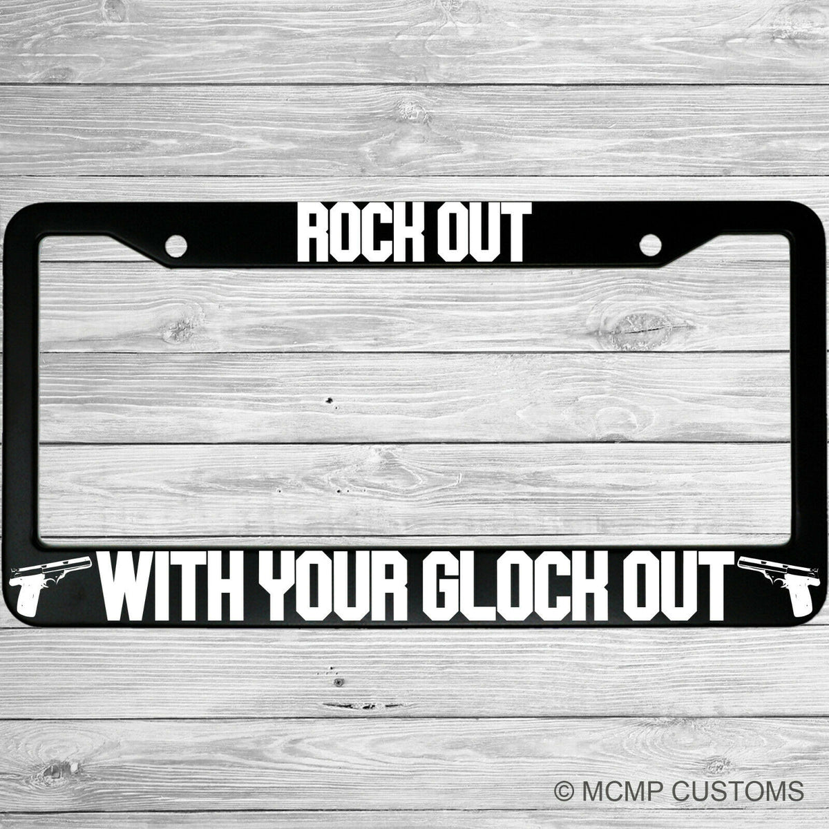 "Rock Out With Your Glock Out" license plate frame shown on vehicle — lifestyle photo